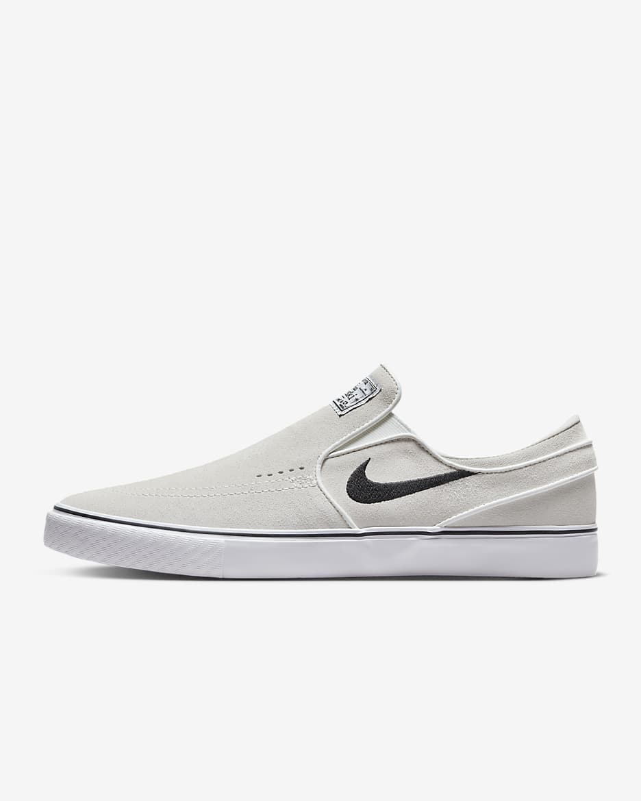 Nike sb janoski slip on black and white on sale